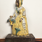 Bradley & Hubbard Woman in Yellow Dress Doorstop